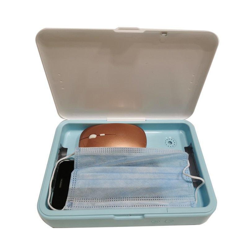 Škatlica za UV dezinfekcijo in brezžično polnjenje telefona